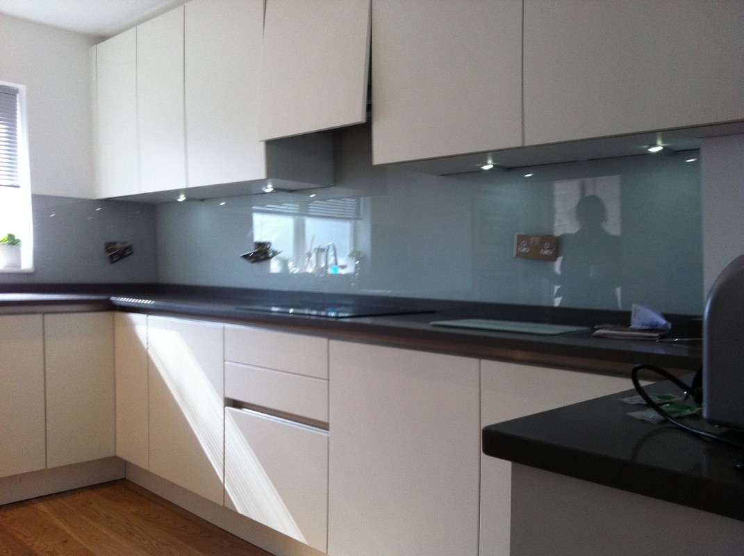Grey glass kitchen splashback with LED lighting in Milton Keynes