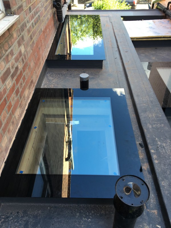 Multiple flat roof skylights on extension in Milton Keynes