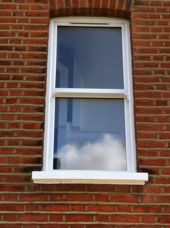 uPVC sash window on Victorian red brick house in Milton Keynes